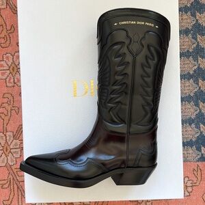 Christian Dior black colour-block western boots.